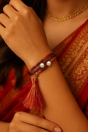Elegant Gemstone Rakhi with Cornelian, Amethyst, and Rhodolite Garnet